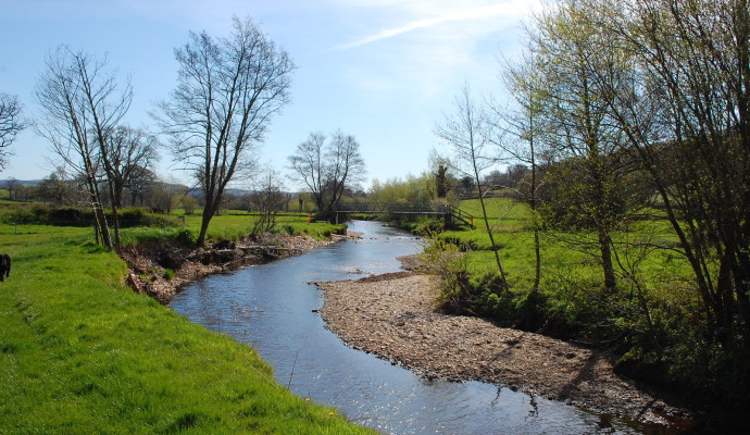 Photo of a stream through fields on the East Devon Way