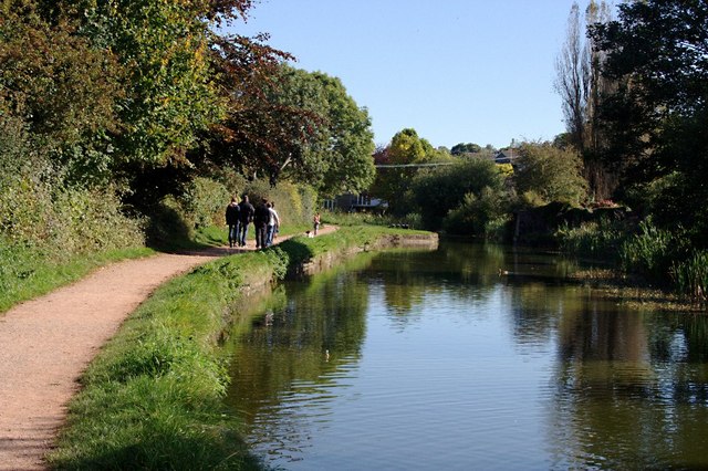 Photo of the Grand Western Canal with walkers on the tow path