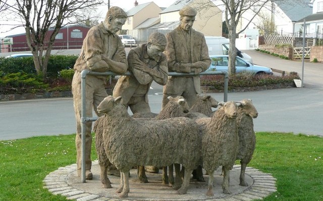 Photo of a sculpture of sheep and farmers