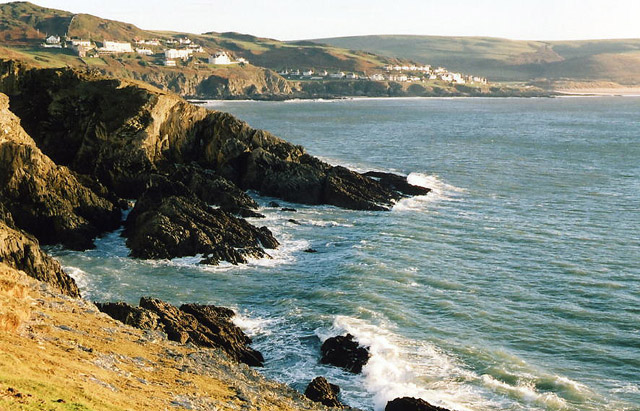 Photo looking along the coast past rocky cliffs to Mortehoe and Woolacombe from Morte Point