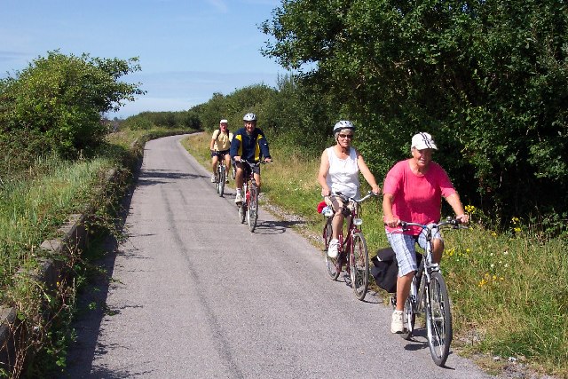 Photo of cyclists on a quite lane on the Tarka Trail