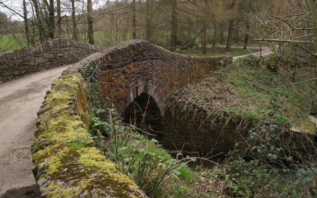 Photo of a quite lane crossing Stowford Bridge on the Two Castles Trail