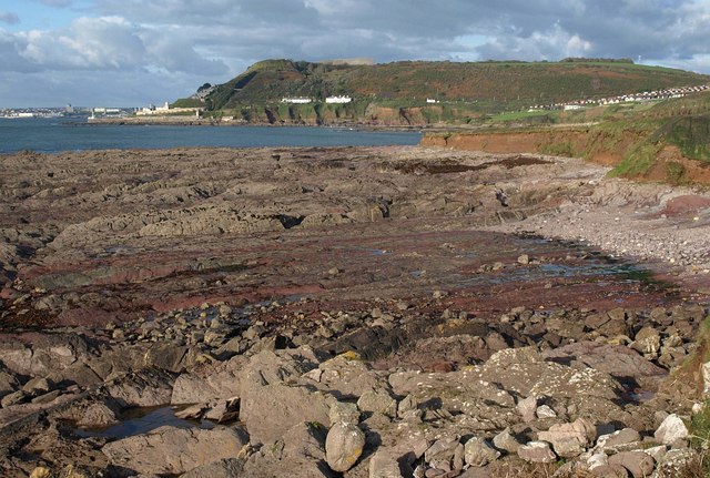 Photo of a rocky shore and the south Devon coastline at Andurn Point near Plymouth