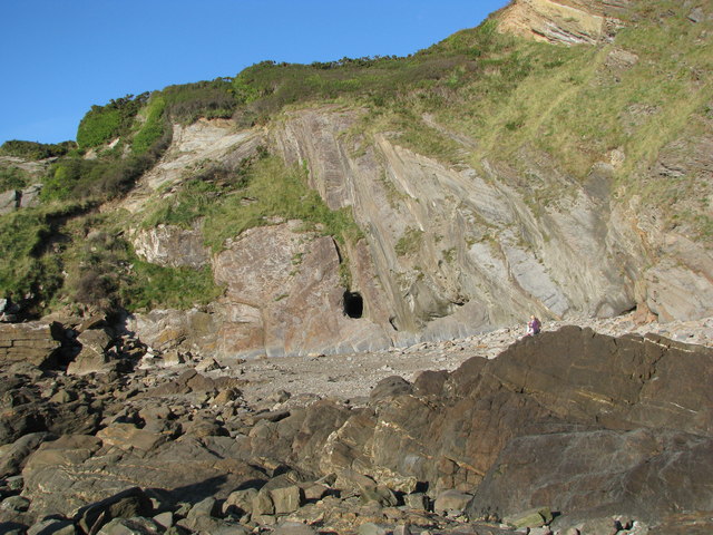 Photo of a rocky beach with cliffs at Combe Martin