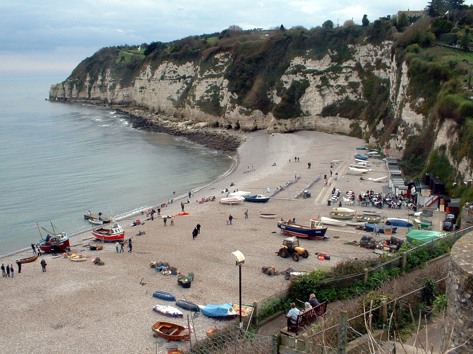 Photo looking down on the pebble beach at Beer with chalk cliffs in the background