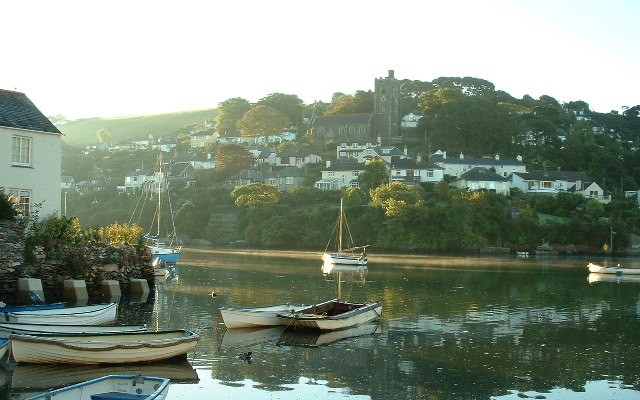 Photo looking across Newton Creek to Noss Mayo with church on the hill at the center