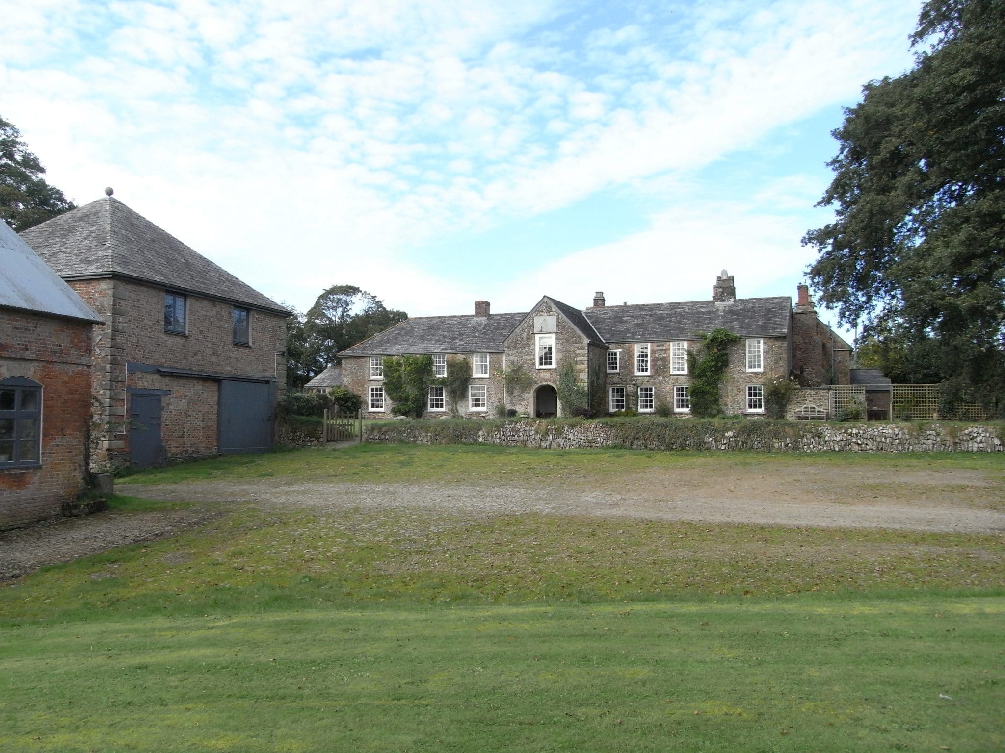 Photo of Tetcott Mano House and outbuildings