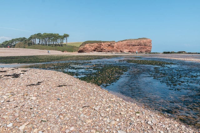 Photo of the otter estuary where it meets the pebble beach at Budleigh