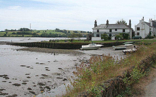 Photo of boats on the mud in front of houses at Bere Ferris