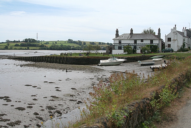 Photo of boats on the mud in front of houses at Bere Ferris