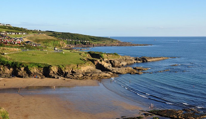 Photo looking across the beach at Bovisand from the coast path