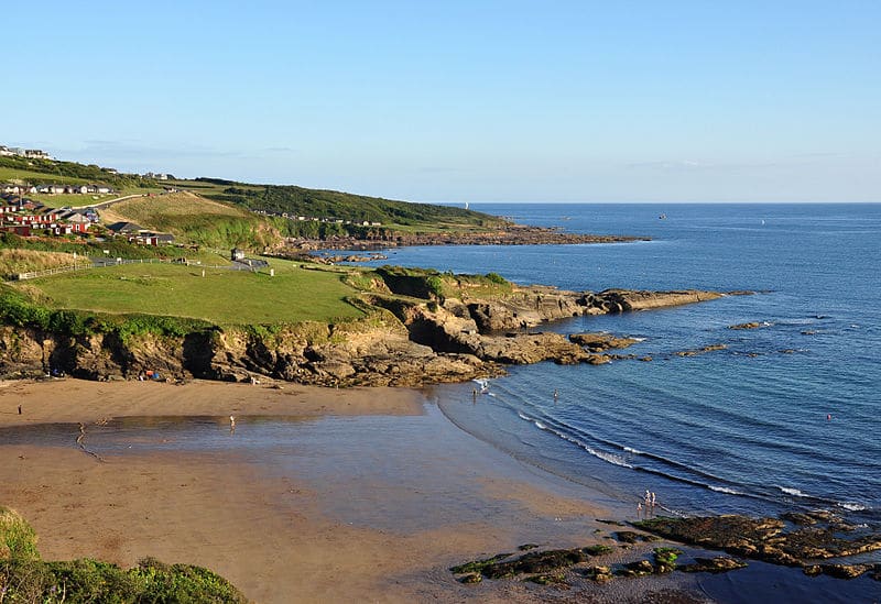 Photo looking across the beach at Bovisand from the coast path