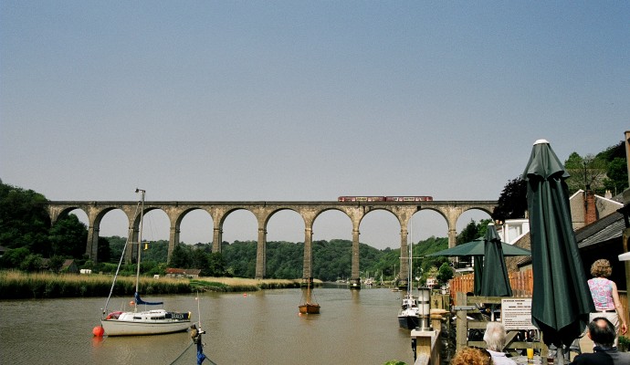 Photo of the Tamara River at Calstock with the Calstock viaduct in the background