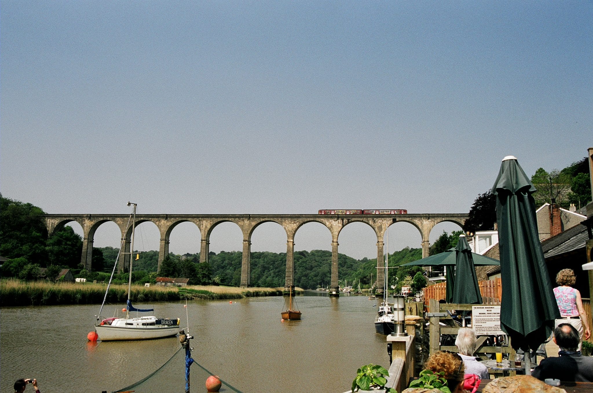 Photo of the Tamara River at Calstock with the Calstock viaduct in the background