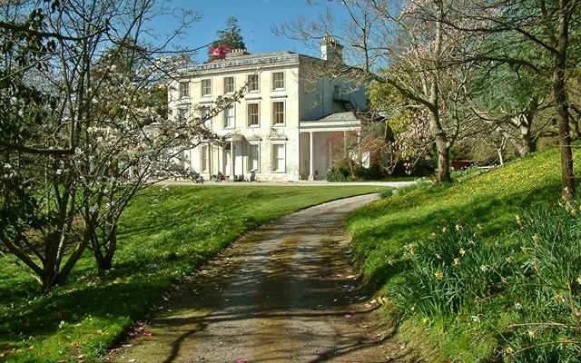 Photo of Greenway House looking up along the drive