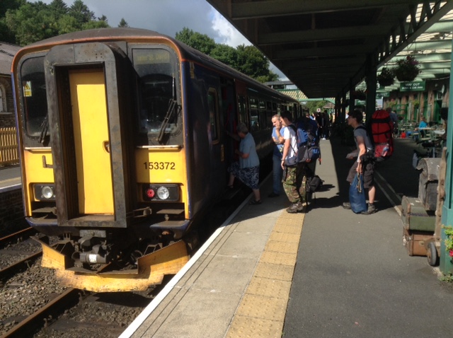 Photo of passengers barding the Sunday Rover train from the station platform