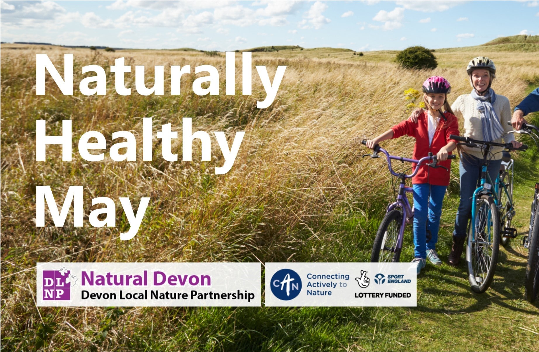 Naturally Healthy May logo; family on bicycles in grassland