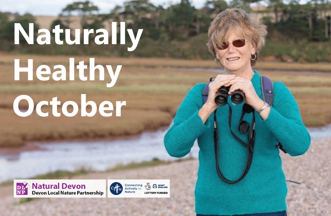 Photo of a woman with binoculars bird watching on the Otter Estuary with the text 'Naturally Healthy October'