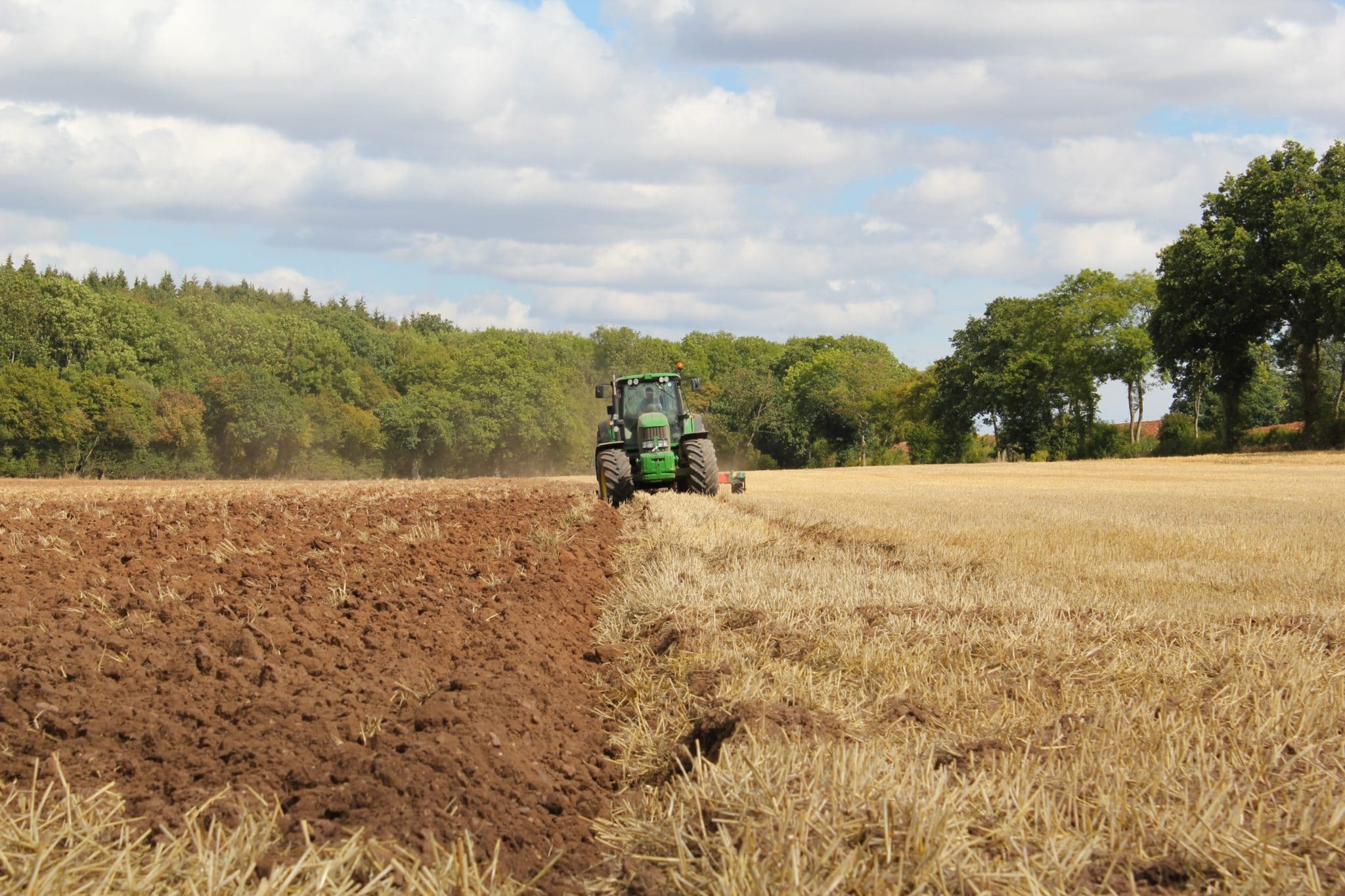 Photo of a tractor ploughing a field by Richard Bell