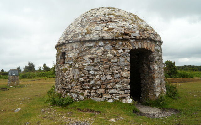 Small domed stone building.