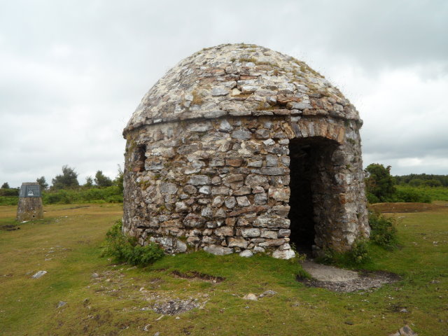 Small domed stone building.